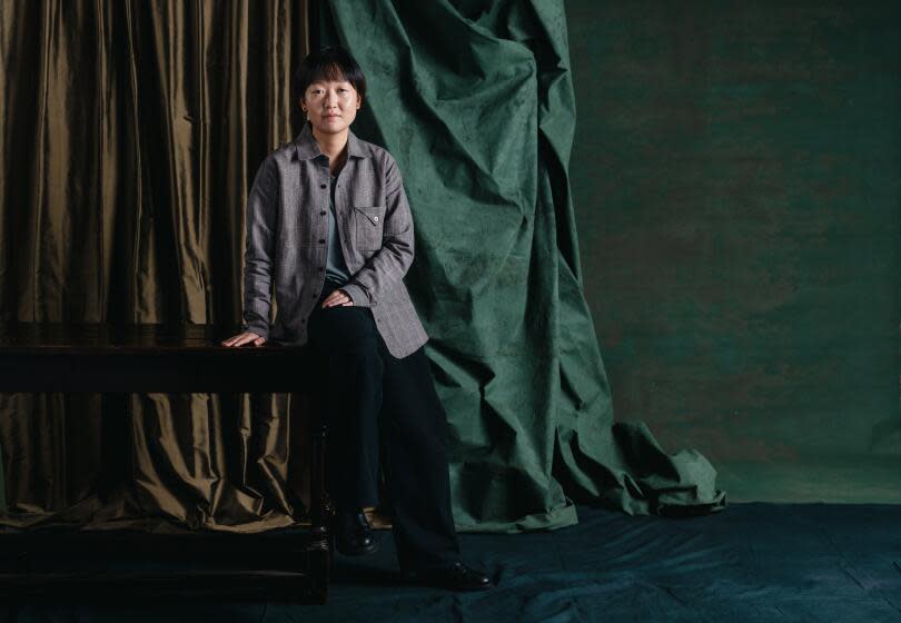 El Segundo, CA - November 18: Oscar-contending director Celine Song poses for a portrait on Saturday, Nov. 18, 2023 in El Segundo, CA. (Jason Armond / Los Angeles Times)