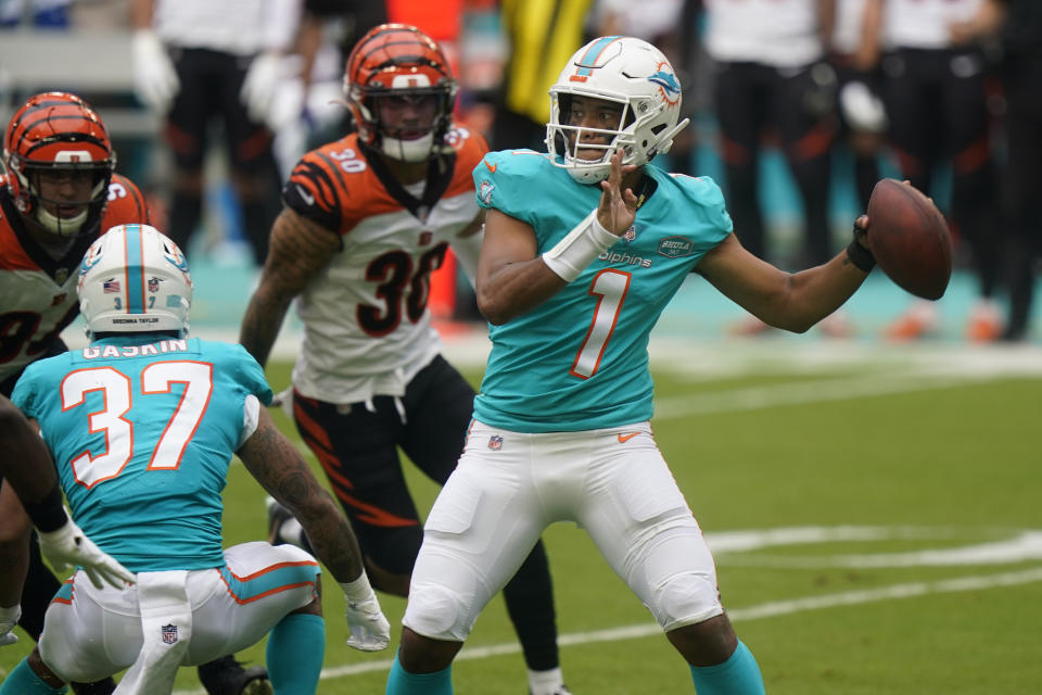 Miami Dolphins quarterback Tua Tagovailoa (1) looks to pass the football during the first half of an NFL football game against the Cincinnati Bengals, Sunday, Dec. 6, 2020, in Miami Gardens, Fla. (AP Photo/Wilfredo Lee)
