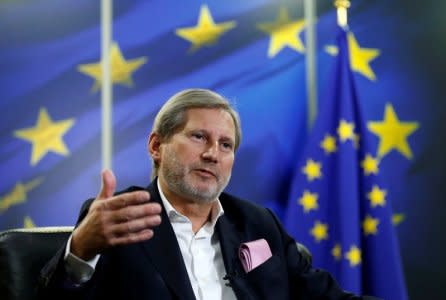 European Neighbourhood Policy and Enlargement Negotiations Commissioner Johannes Hahn speaks during an interview with Reuters at the EU Commission headquarters in Brussels, Belgium January 18, 2018. REUTERS/Francois Lenoir