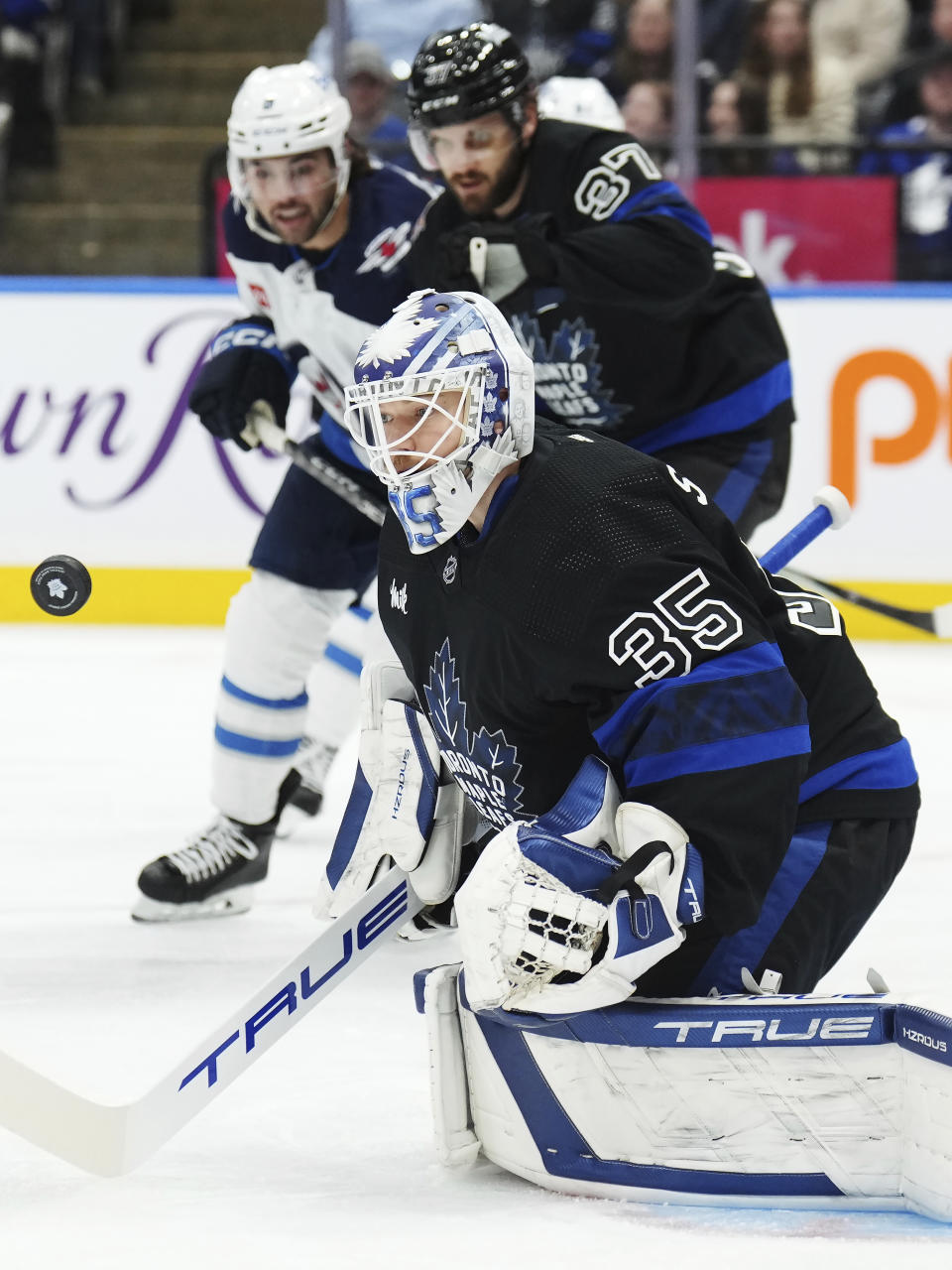 Toronto Maple Leafs goaltender Ilya Samsonov (35) makes a save against the Winnipeg Jets during the first period of an NHL hockey game in Toronto, Wednesday, Jan. 24, 2024. (Nathan Denette/The Canadian Press via AP)