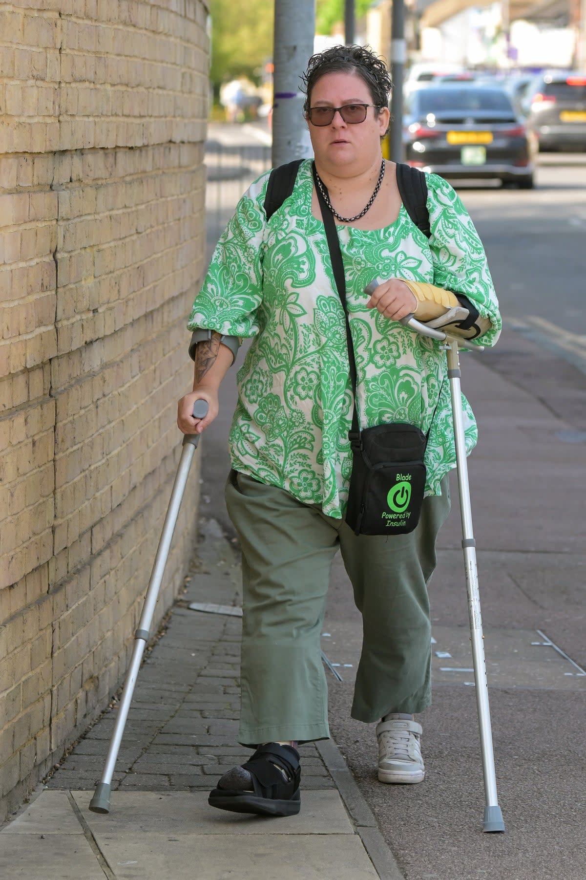 Blade Silvano, 40 arriving at Cambridge Crown court where she is accused of pretending to be a man to have sex with a woman (James Linsell-Clark SWNS)