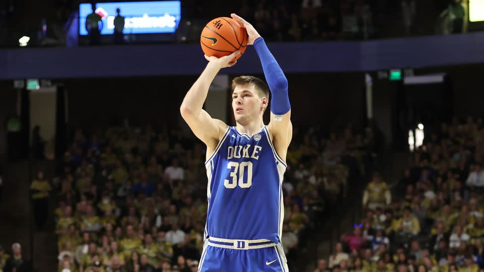Duke Blue Devils center Kyle Filipowski makes a three-point shot during against the Wake Forest Demon Deacons. - Cory Knowlton/USA Today Sports/Reuters