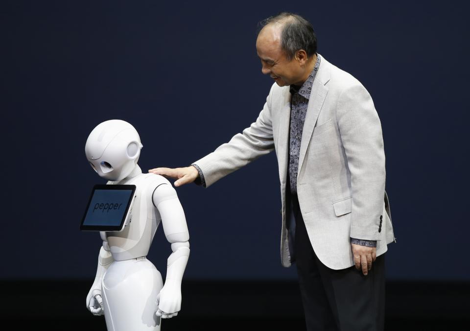 SoftBank Corp. Chief Executive Son presents the company's human-like robots in Urayasu