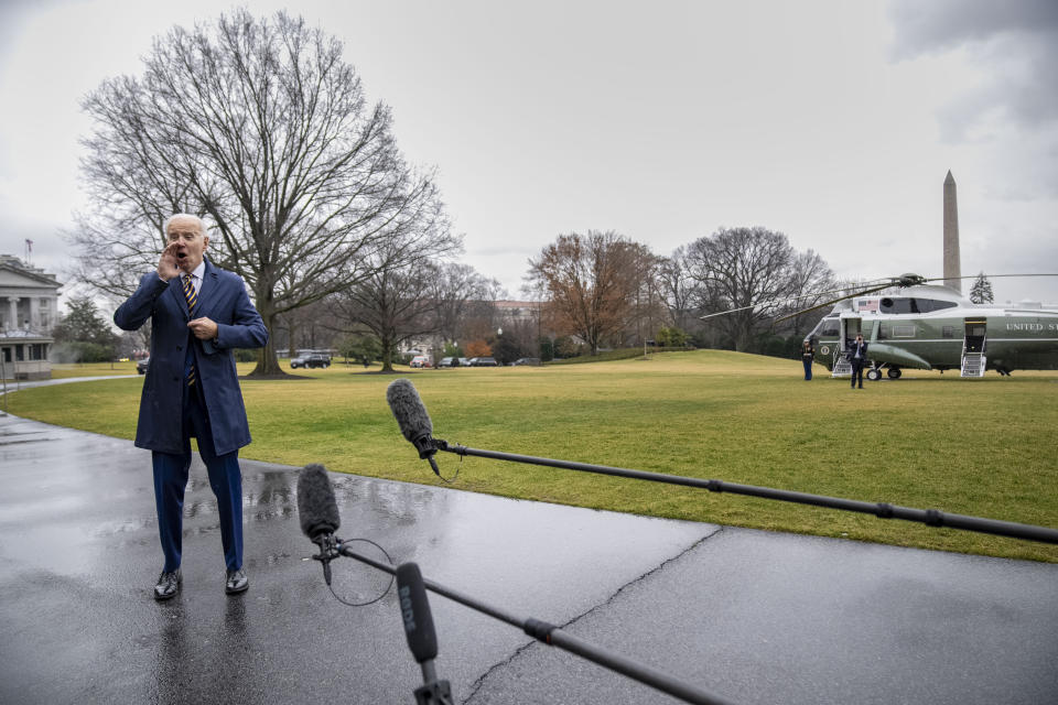 President Joe Biden speaks to reporters on the South Lawn of the White House before boarding Marine One in Washington, Tuesday, Jan. 31, 2023, for a short trip to Andrews Air Force Base, Md., and then on to New York. (AP Photo/Andrew Harnik)