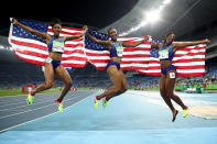 <p>The U.S. became the first country ever to <a rel="nofollow" href="http://sports.yahoo.com/video/u-women-sweep-100m-hurdles-051958592.html" data-ylk="slk:sweep the medals;elm:context_link;itc:0;outcm:mb_qualified_link;_E:mb_qualified_link;ct:story;" class="link  yahoo-link">sweep the medals</a> in the women's 100m hurdles event. Kristi Castlin (L) took home bronze, Nia Ali earned silver (R) and Brianna Rollins (C) won gold. (Photo by Cameron Spencer/Getty Images) </p>