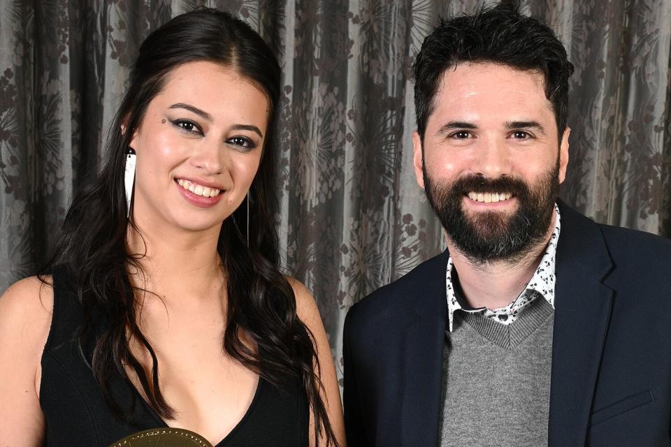 Amber Midthunder and Dan Trachtenberg poses for a portrait at the 50th anniversary of the Saturn Awards at The Marriott Burbank Convention Center on October 25, 2022 in Burbank, California