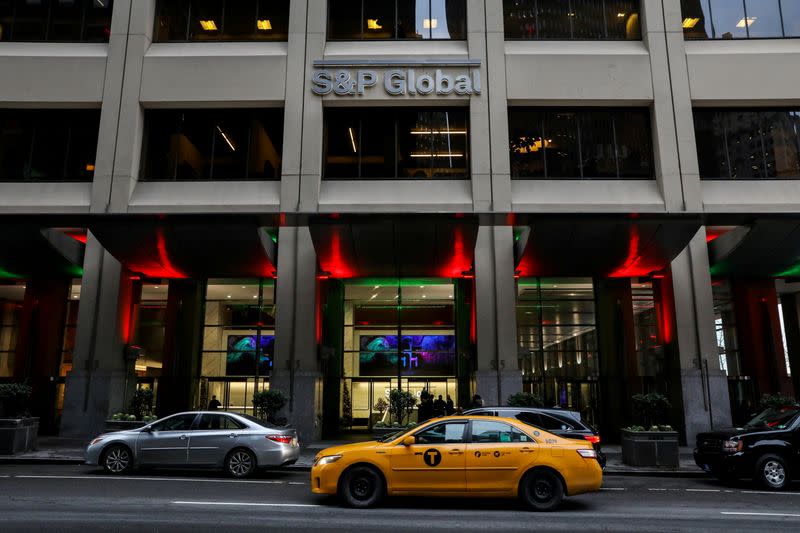 FILE PHOTO: The S&P Global logo is displayed on its offices in the financial district in New York