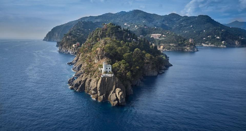 <p><a href="http://www.laportofinese.it/en/portfolio_page/portofino-lighthouse/" rel="nofollow noopener" target="_blank" data-ylk="slk:Al Faro di Portofino;elm:context_link;itc:0;sec:content-canvas" class="link ">Al Faro di Portofino</a> is located on the terrace of Portofino’s 100-year-old lighthouse, and boasts some of the most breathtaking views in the area. The bar can only be reached on foot, and while the meandering path does include quite a few stairs, the chance to see some of Portofino’s most famous landmarks up close makes the walk well worth it. When you arrive at the lighthouse, which juts into the sea at the tip of Portofino, you can reward yourself with spritzes, wine, locally brewed beer, and plenty of snacks. The terrace can also be rented out for private dinners, where guests can enjoy gourmet meals while taking in the sunset.</p>