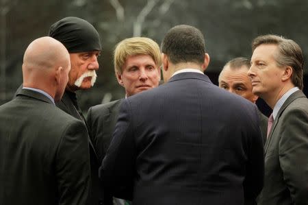 Terry Bollea (2nd L), aka Hulk Hogan, meets with lawyers before his trial against Gawker Media, in St Petersburg, Florida March 17, 2016. REUTERS/Dirk Shadd/Tampa Bay Times/Pool via Reuters