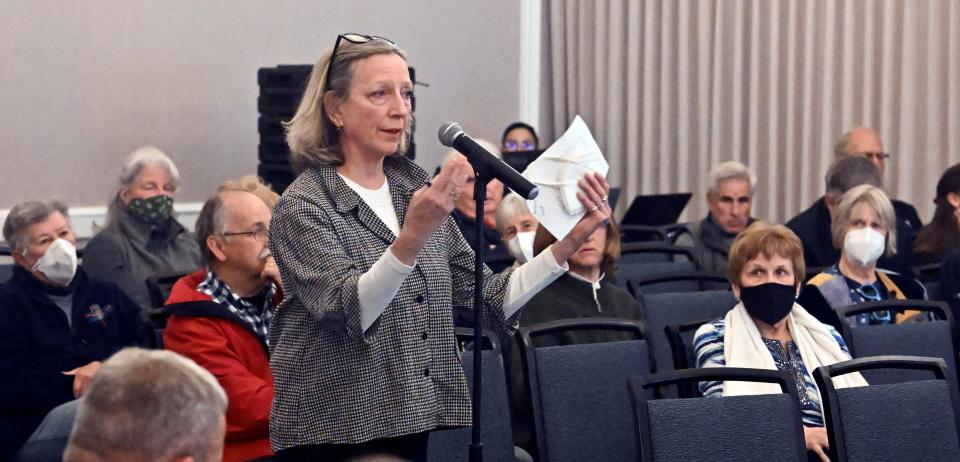 Diane Turco of Harwich and Cape Downwinders address the Nuclear Regulatory Commission representatives at a hearing in May in Plymouth.