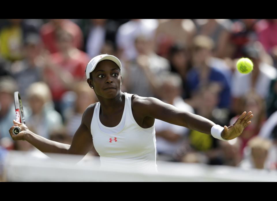 Sloane Stephens of the United States returns a shot to Sabine Lisicki of Germany during a third round women's singles match at the All England Lawn Tennis Championships at Wimbledon, England, Friday, June 29, 2012.