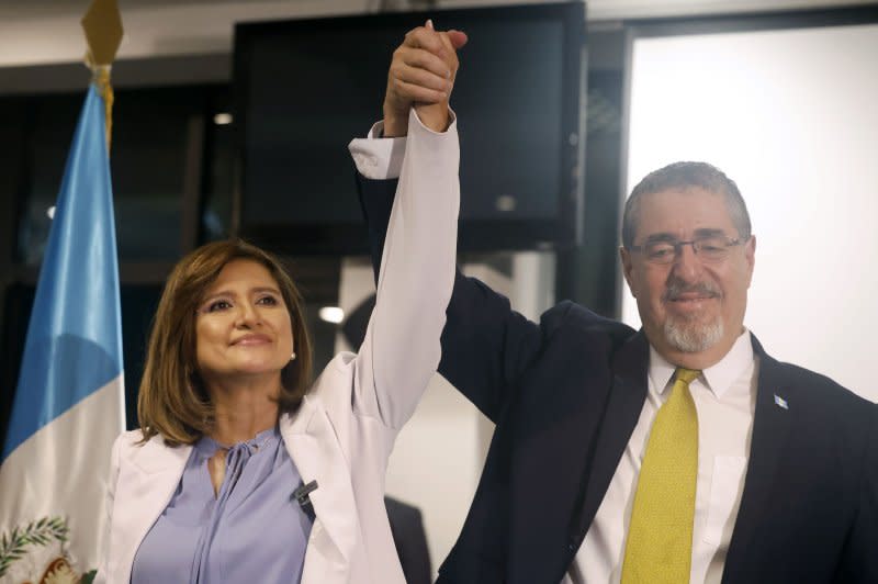 Guatemalan president-elect Bernardo Arevalo (R, with Vice President Karin Herrera in August after his electoral win) will travel to Washington, D.C., next week to meet with Vice President Kamala Harris and Biden administration officials. File Photo by Esteban Biba/EPA-EFE