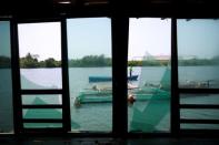 Broken windows of an abandon bar, due to the local violence are seen in front of the Pemex oil port known as Dos Bocas en Paraiso, Tabasco, Mexico April 24, 2018. REUTERS/Carlos Jasso/Files