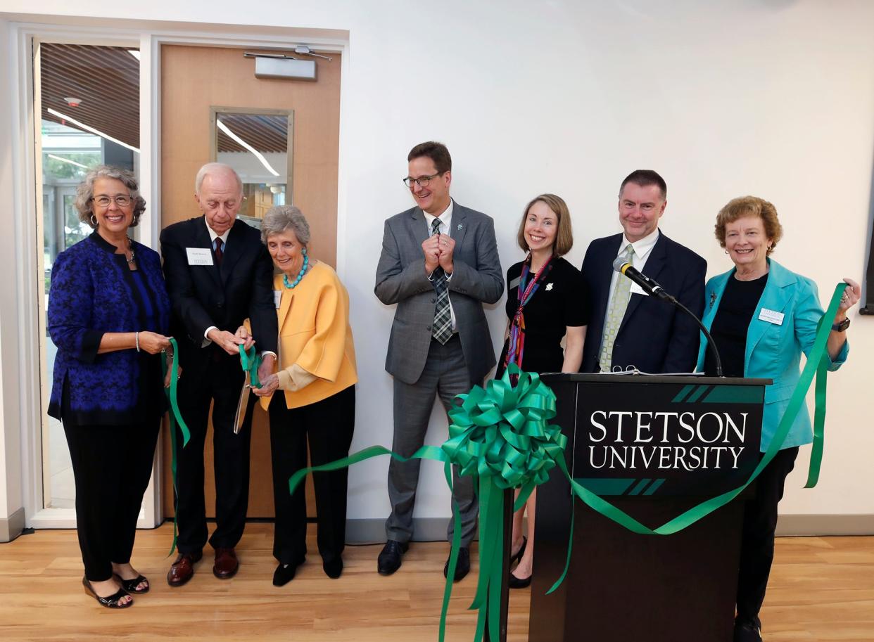 Cici and Hyatt Brown cut the ribbon for the new Brown Hall for Health & Innovation at Stetson University in DeLand, Friday, Oct. 28, 2022.
