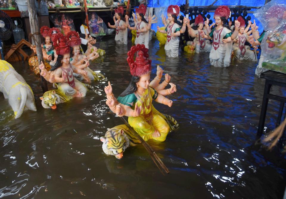 Mumbai: Idols of Goddess Amba Mata Devi immersed in floodwater after heavy rain, at a workshop in Chinchpokli area of Mumbai, Wednesday, Sept. 23, 2020. (PTI Photo)(PTI23-09-2020_000097A)