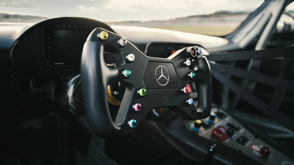 The steering wheel on the 2024 Mercedes-AMG GT2 race car.