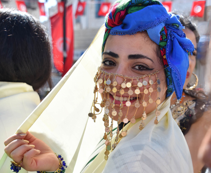 A woman wearing a traditional jewellery veil in Tunis, Tunisia - Sunday 13 March 2022