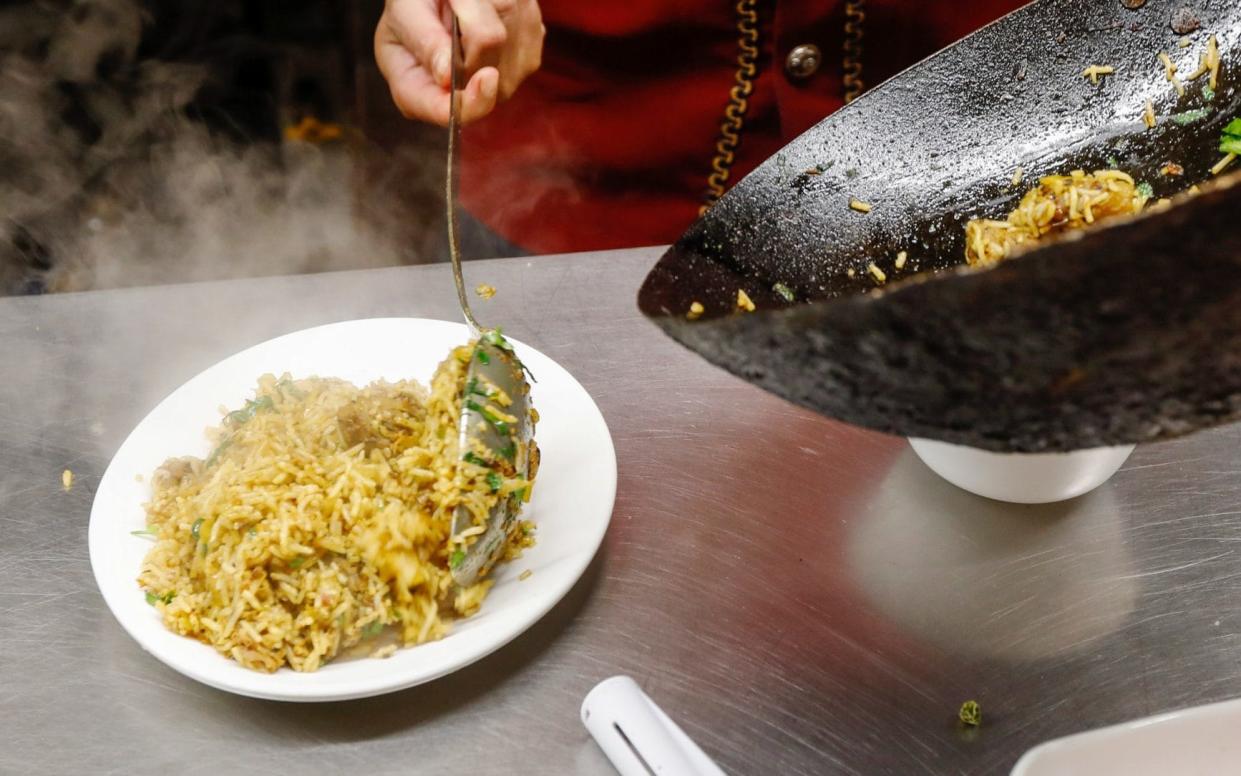 Witnesses reported attendees falling ill after eating a rice dish - Bloomberg