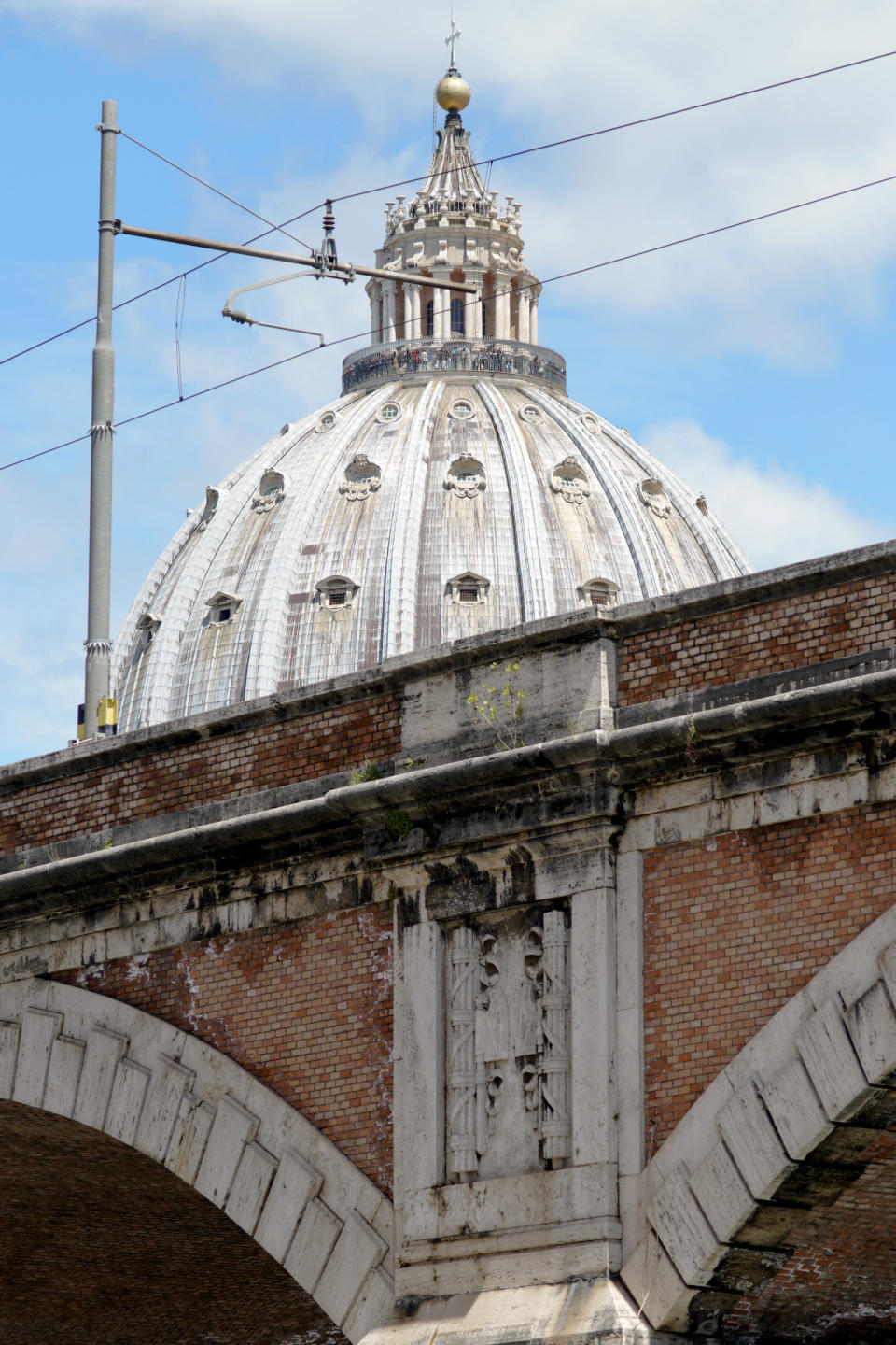 Fasces, a bundle of rods tied around an axe, the symbol which Italian dictator Benito Mussolini adopted from ancient Rome, are seen carved in a bridge by St. Peter's Basilica, in Rome, Monday, May 6, 2019. While Germany systematically wiped out traces of Adolf Hitler’s Nazi regime after World War II, the legacy of his Axis ally, Benito Mussolini, remains present in Italy even today. (AP Photo/Andrew Medichini)
