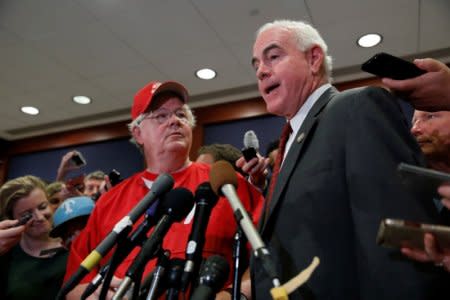 FILE PHOTO: Rep. Patrick Meehan (R-PA), accompanied by Rep. Joe Barton (R-TX), speaks with the media at the U.S. Capitol Building in Washington, U.S., June 14, 2017. REUTERS/Aaron P. Bernstein