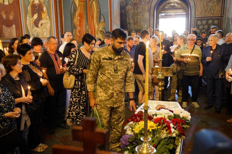 Ukrainian lawmaker and soldier Yehor Firsov attends the funeral ceremony of Ukrainian theologian Ihor Kozlovskyi in Kyiv, Ukraine, on Sept. 9, 2023. (Dmytro Larin/Global Images Ukraine via Getty Images)