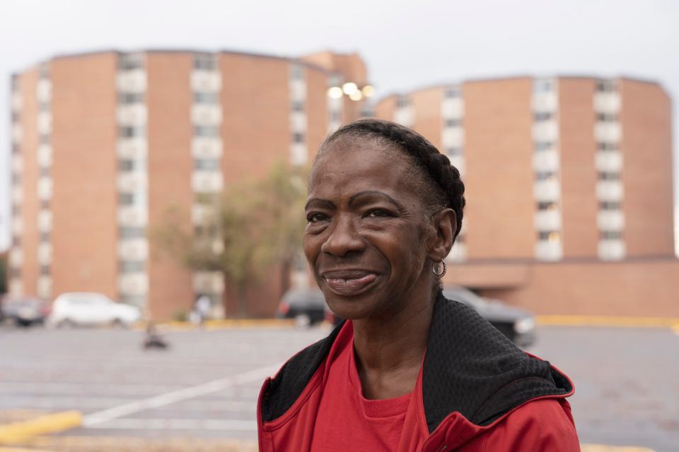 Joyce Warren stands for a portrait outside of Memphis Towers last month.