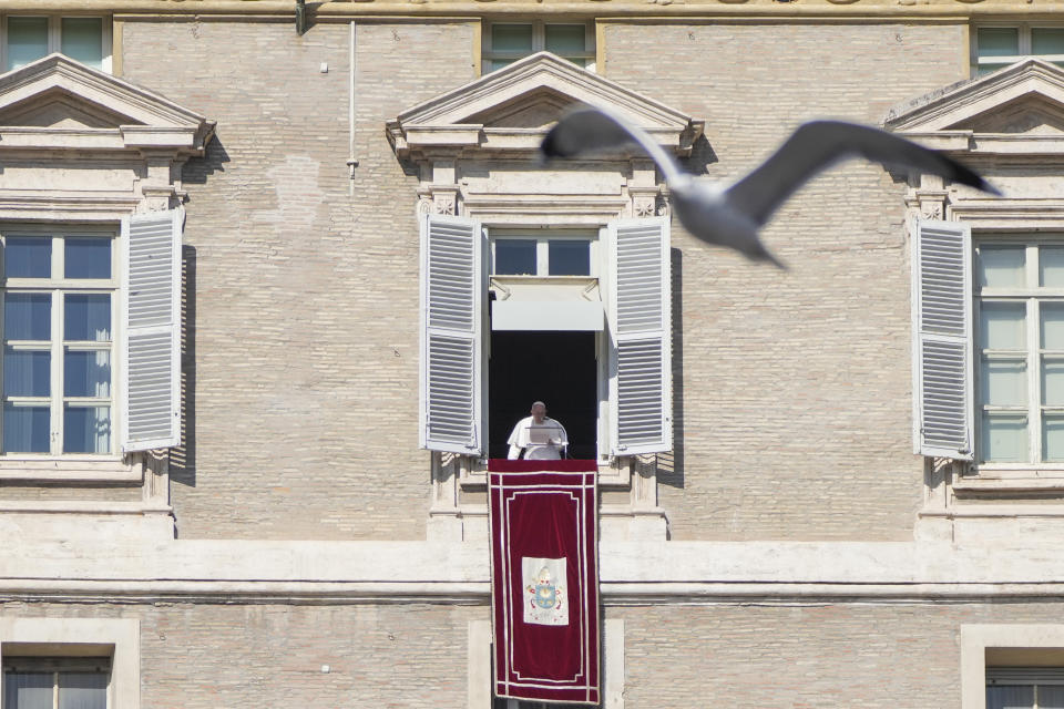 Pope Francis delivers his speech during the Angelus noon prayer from the window of his studio overlooking St.Peter's Square, at the Vatican, Sunday, Feb. 12, 2023. (AP Photo/Alessandra Tarantino)