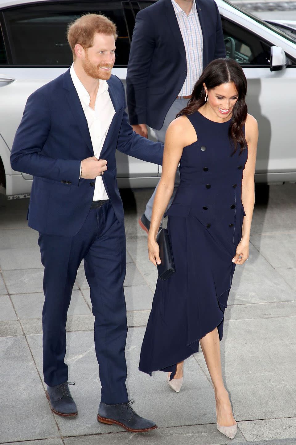 <p><strong>October 2018 </strong>The Duke and Duchess of Sussex arrive at the Auckland War Memorial Museum for a reception as part of their <a rel="nofollow noopener" href="https://www.harpersbazaar.com/uk/culture/culture-news/g23813540/royal-tour-australia-harry-meghan/" target="_blank" data-ylk="slk:royal tour;elm:context_link;itc:0;sec:content-canvas" class="link ">royal tour</a>, she wore a navy Antonio Berardi dress. </p>