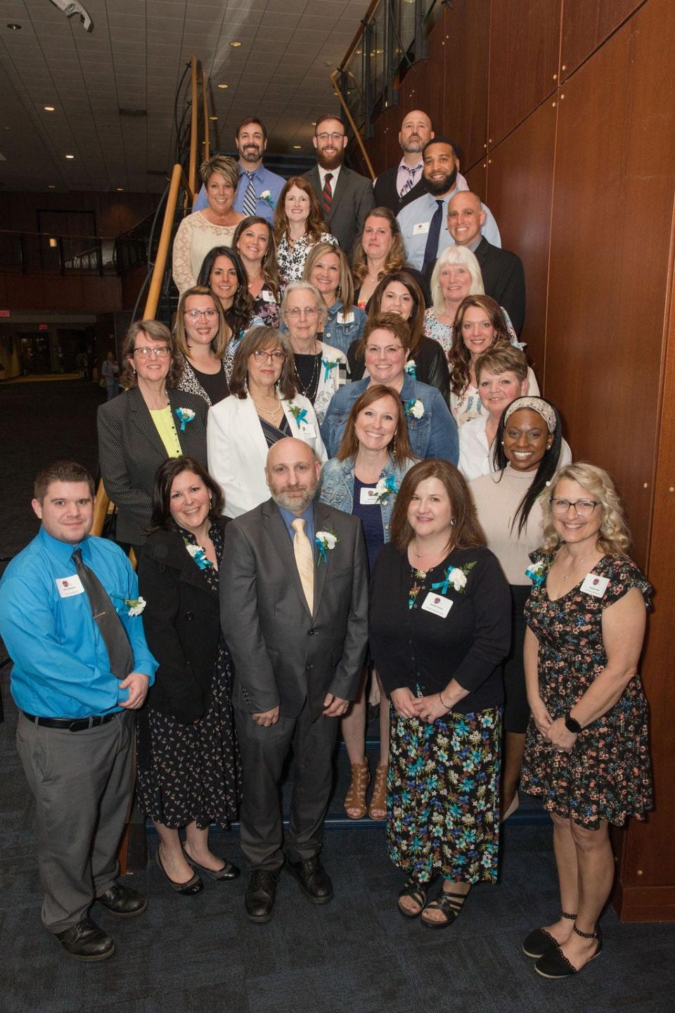 Teachers who were named to the All-County Teaching Team. Janelle Hart, pictured center in the second row from bottom, was named the Stark County Teacher of the Year.