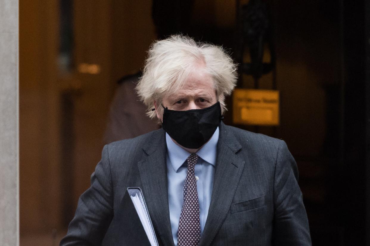 <p>Boris Johnson on his way to announce the lockdown easing timeline in the Commons</p> (Barcroft Media via Getty Images)