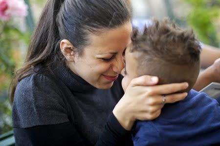 Nour Essa, 30, from Syria, plays with her son Riad, 2, during an interview with Reuters at the Sant'Egidio community in Rome, Italy, April 20,2016. REUTERS/Max Rossi