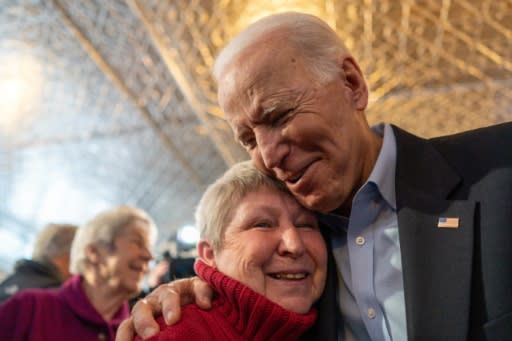 Democratic White House hopeful candidate Joe Biden, the former vice president, greets a voter during a campaign event on January 31, 2020 in Burlington, Iowa