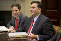 FILE - In this Nov. 4, 2014, file photo Centers for Disease Control and Prevention director Dr. Thomas Frieden, left, and Ebola coordinator Ron Klain, attend a meeting with President Barack Obama and members of his national security and public health teams to receive an update on the Ebola response in the Roosevelt Room of the White House in Washington. Klain is preparing to serve as President-elect Joe Biden’s chief of staff, a job often referred to as the nation’s chief operating officer. (AP Photo/Jacquelyn Martin, File )