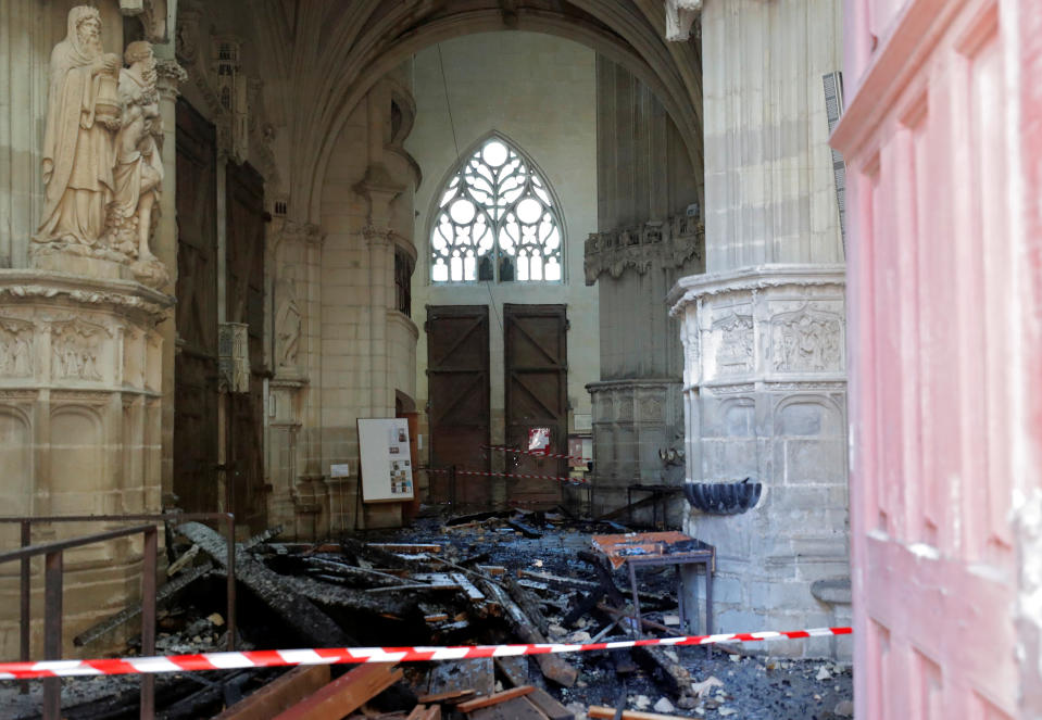 A view of debris caused by a fire inside the Cathedral of Saint Pierre and Saint Paul in Nantes, France, July 18, 2020. REUTERS/Stephane Mahe