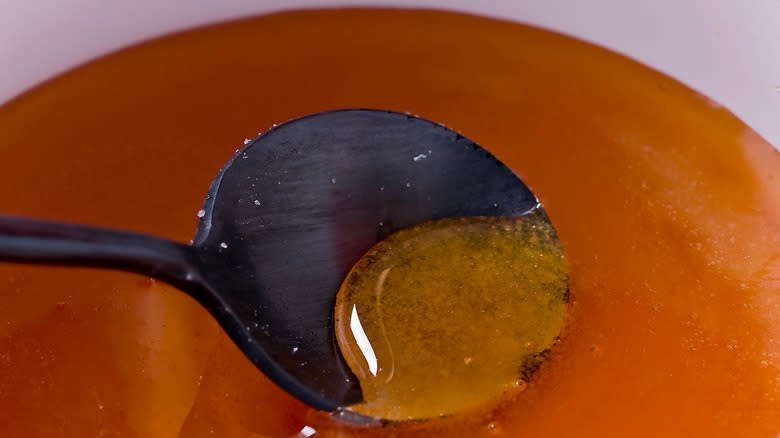 spoon in hot sugary syrup 