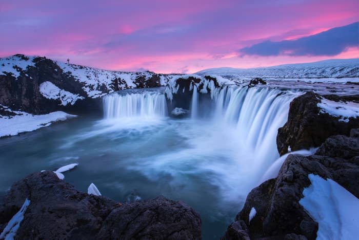 A waterfall in Iceland during sunset