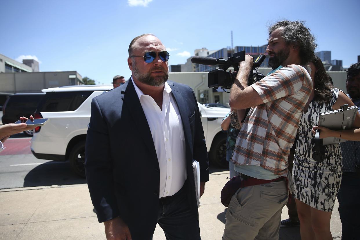 Alex Jones arrives at the Travis County Courthouse in Austin,  Tecxas, on Tuesday.
