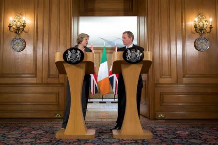 Britain's Prime Minister Theresa May (L) and Irish Taoiseach Enda Kenny hold a joint news conference inside 10 Downing Street, London, Britain July 26, 2016. REUTERS/Stefan Rousseau/Pool