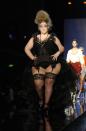 <p>A decade ago, plus size was barely a term let alone seen on the catwalk. But Jean Paul Gaultier was always trying to push boundaries. After the news that two anorexic models had starved themselves to death, he cast the world’s biggest model at the time: Velvet D’Amour. JPG didn’t stop there, dressing her in a lingerie look to further show off those curves. <i>[Photo: Rex]</i> </p>