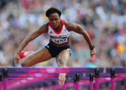 LONDON, ENGLAND - AUGUST 06: Tiffany Porter of Great Britain competes in the Women's 100m Hurdles heat on Day 10 of the London 2012 Olympic Games at the Olympic Stadium on August 6, 2012 in London, England. (Photo by Stu Forster/Getty Images)