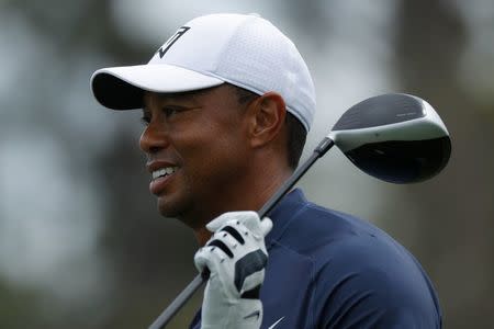 Tiger Woods of the U.S. walks up the 8th fairway during the final day of practice for the 2018 Masters golf tournament at Augusta National Golf Club in Augusta, Georgia, U.S. April 4, 2018. REUTERS/Brian Snyder