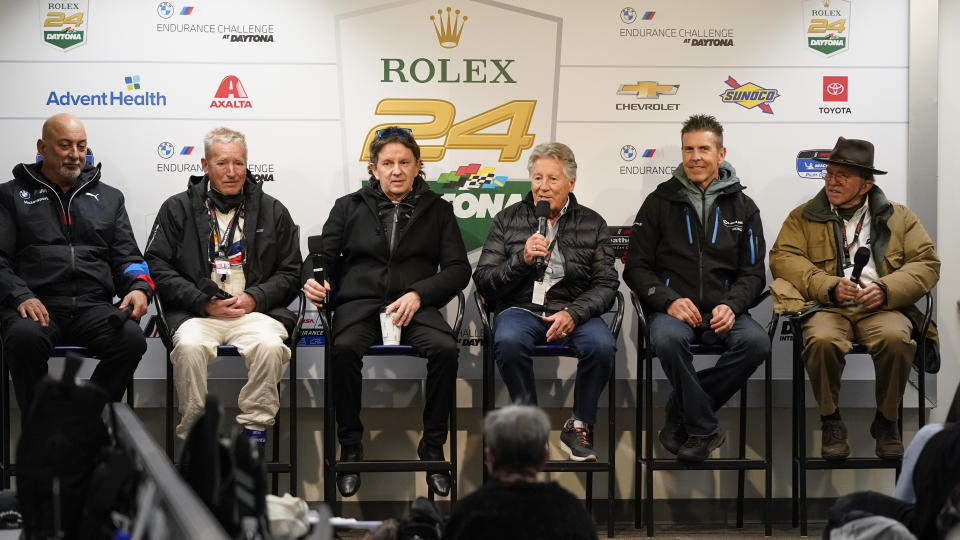 Rolex 24 hour auto race legends, from left, Bobby Rahal, Hurley Haywood, Wayne Taylor, Mario Andretti, Scott Pruett and Jack Roush attend a news conference at Daytona International Speedway, Saturday, Jan. 29, 2022, in Daytona Beach, Fla. (AP Photo/John Raoux)