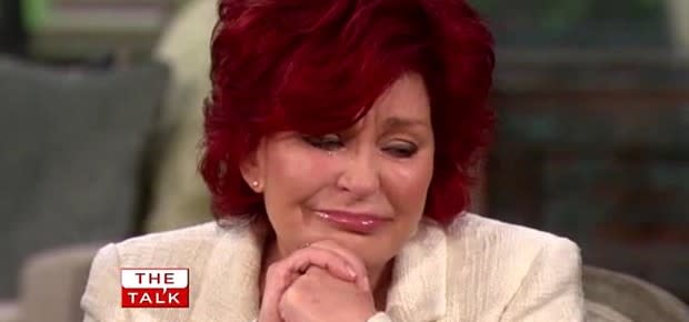 sharon osbourne flashes breast