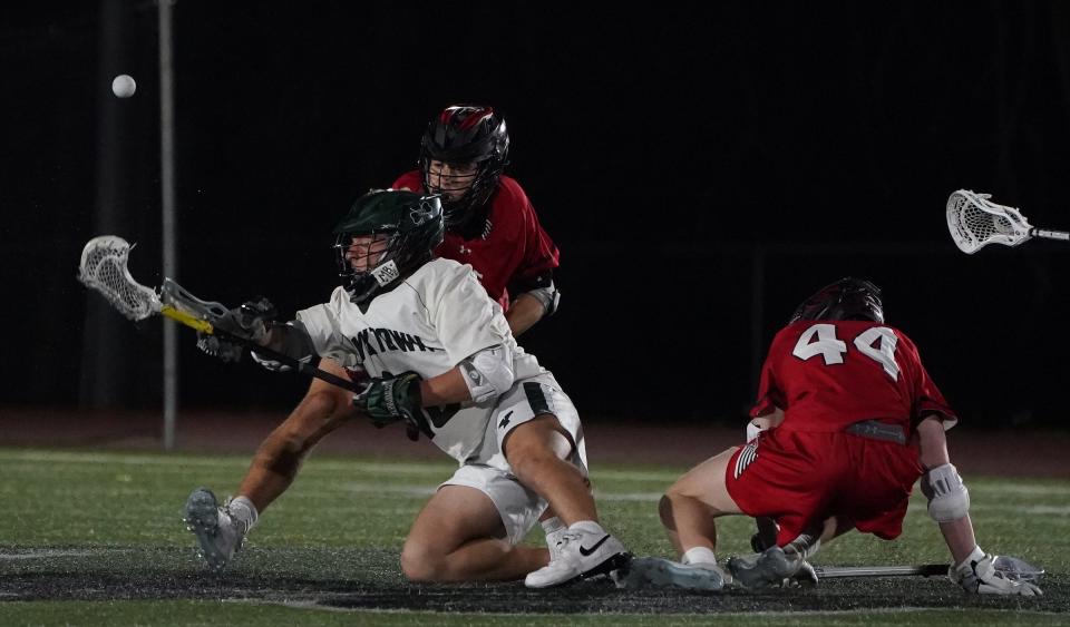 Chad Bowen (10) and Yorktown defeated Rye 9-8 in double overtime in boys lacrosse at Yorktown High School in Yorktown Heights. Tuesday, April 30, 2024.