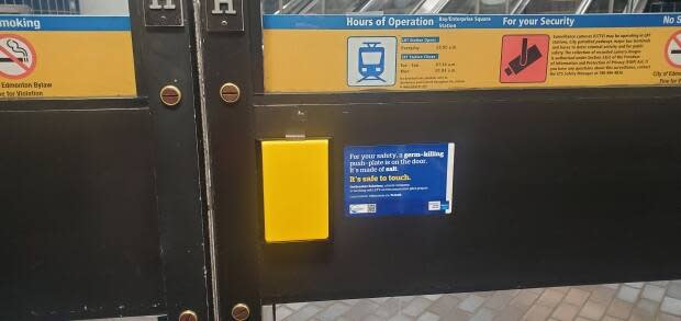 The bright yellow square on this door called a germ-killing push-plate, is made up of compressed salt which ETS says is a safe surface to touch. 