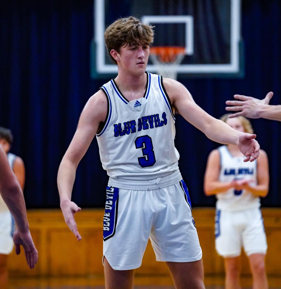 Tipton High School junior Grady Carpenter (3) is congratulated after hitting a free throw shot during a game between Tipton High School and Covenant Christian High School on Saturday, Dec. 16, 2023, at THS in Tipton Ind.