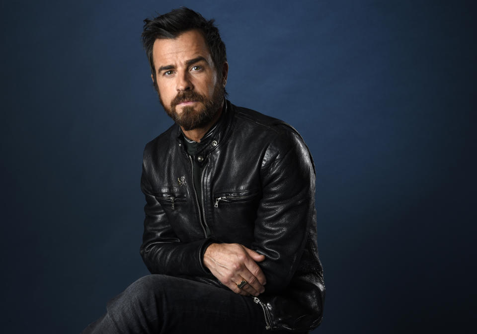 FILE - Justin Theroux poses for a portrait to promote the film "The LEGO Ninjago Movie" on day two of Comic-Con International on July 21, 2017, in San Diego. Theroux turns 49 on Aug. 10. (Photo by Chris Pizzello/Invision/AP)