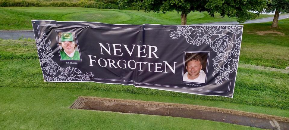 A banner honoring Bill Plante’s father Joe and his son Joe was displayed at the Labor Day Four Ball at Heritage CC.