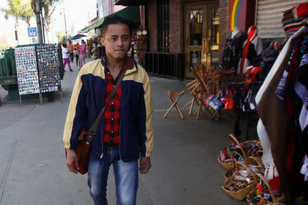 Honduran migrant Ariel, 19, who is waiting for his court hearing for asylum seekers returned to Mexico to wait out their legal proceedings under a new policy change by the U.S. government, is pictured after an interview with Reuters in Tijuana, Mexico March 18, 2019. Picture taken March 18, 2019. REUTERS/Jorge Duenes