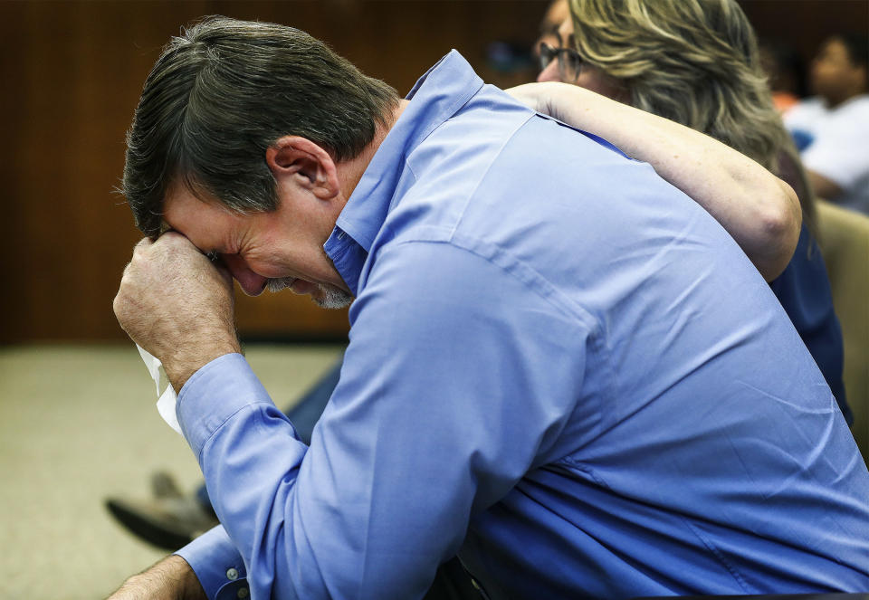 Ben Chambers, father of Jessica Chambers, breaks down during testimony in the retrial of Quinton Tellis in Batesville, Miss., on Wednesday, Sept. 26, 2018. Tellis is charged with burning 19-year-old Chambers to death in December 2014. Tellis has pleaded not guilty to the murder. (Mark Weber /The Commercial Appeal via AP, Pool)